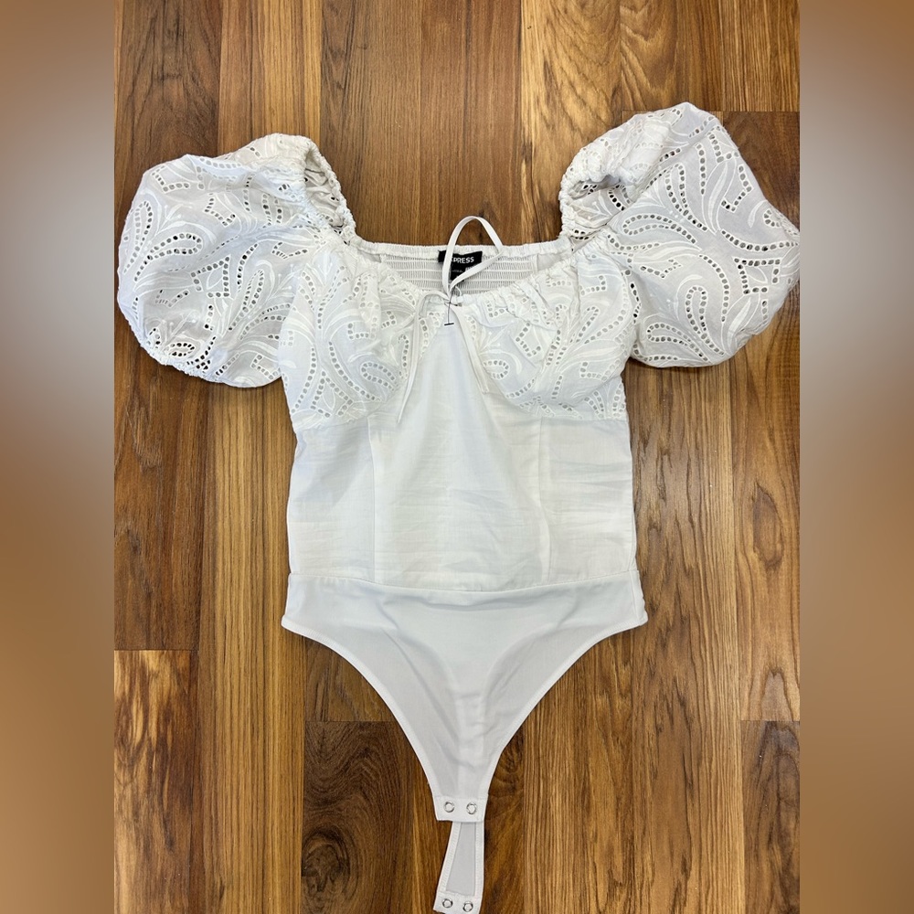Brand new Express Eyelet Puff Sleeve Tie Neck Thong Bodysuit